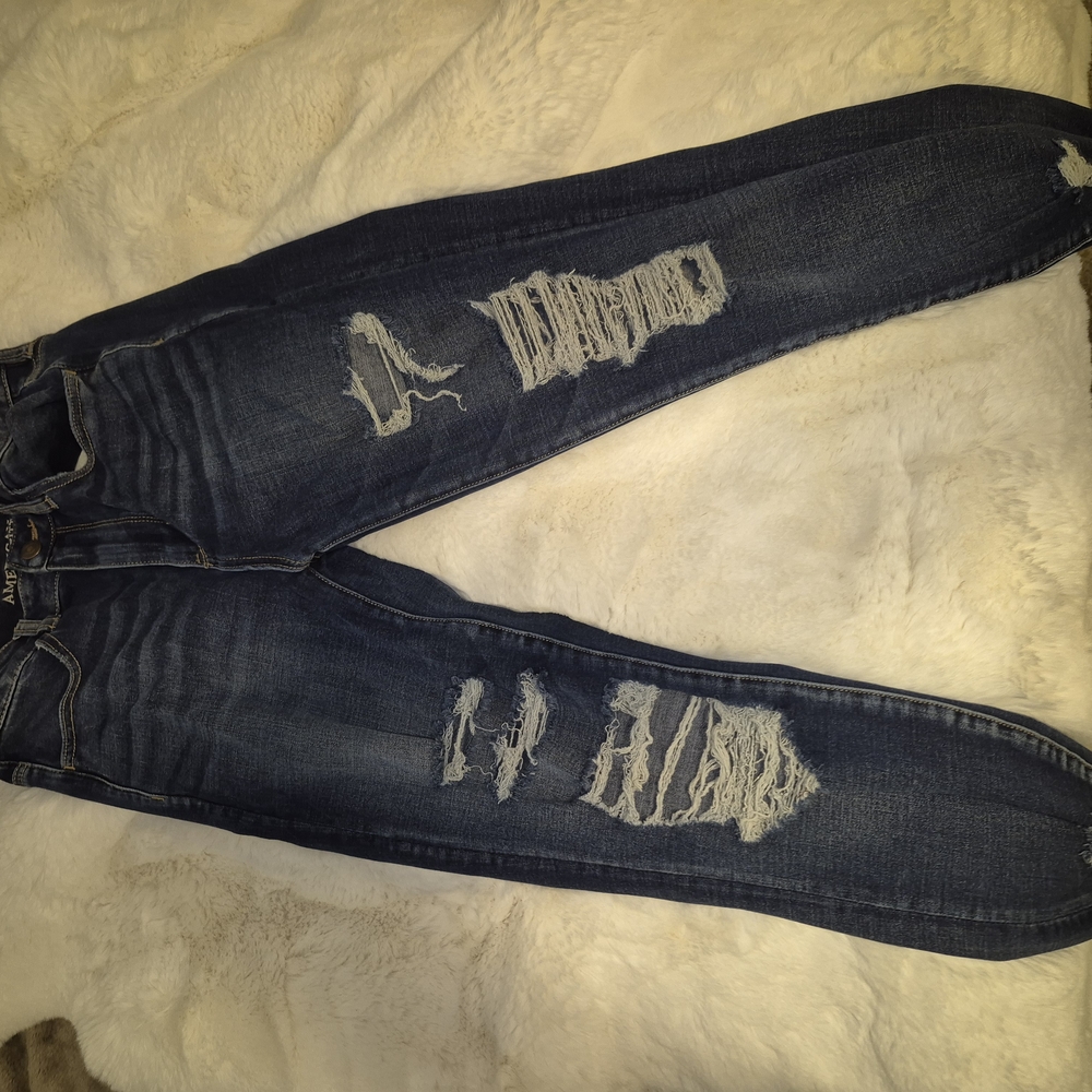 Distressed Blue Jeans